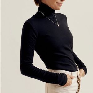 Kotn fitted turtleneck in black, size Medium